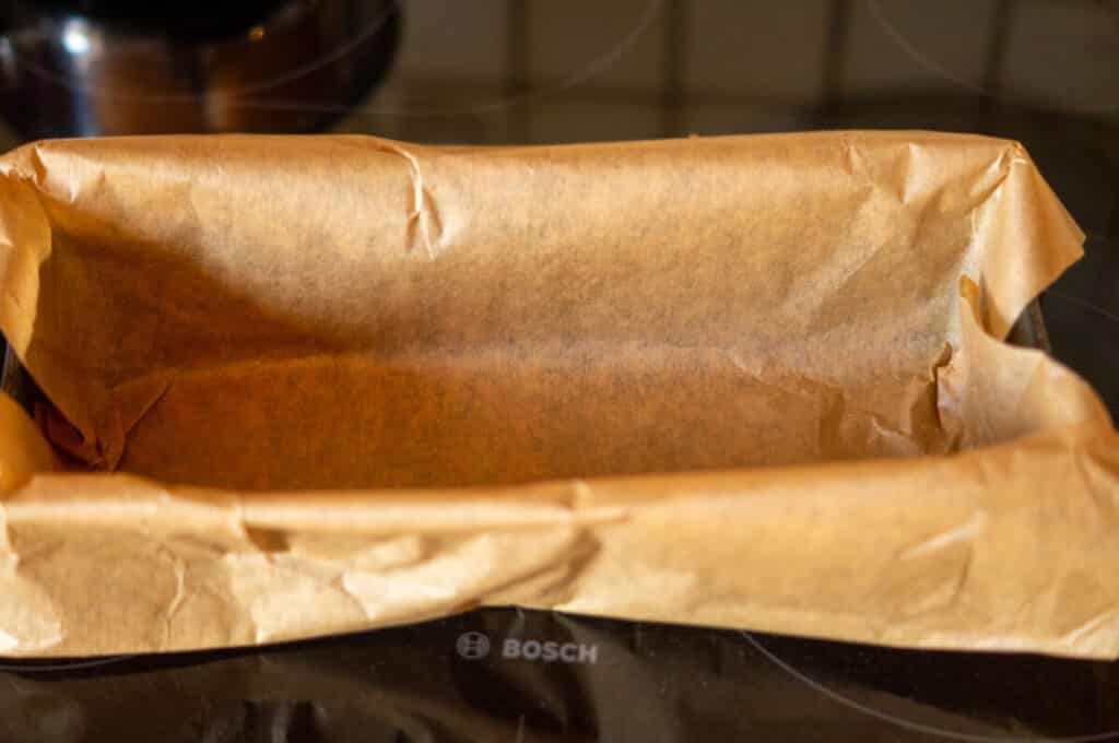 Dinkelbrot Thermomix® (350 g Körner, 100 Min) 8 kastenform mit backpapier auslegen