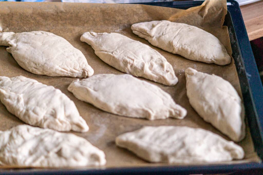 Baguette Brötchen aus dem Thermomix® rustikal 9 baguette broetchen nach dem gehen gewendet